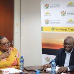Caption; MEC Majuba(right) receiving a report from AGSA Business Unit leader, Bomkazi Bhobho