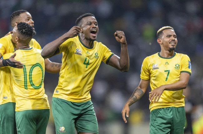 Caption; Bafana Bafana celebrating victory against Rwanda